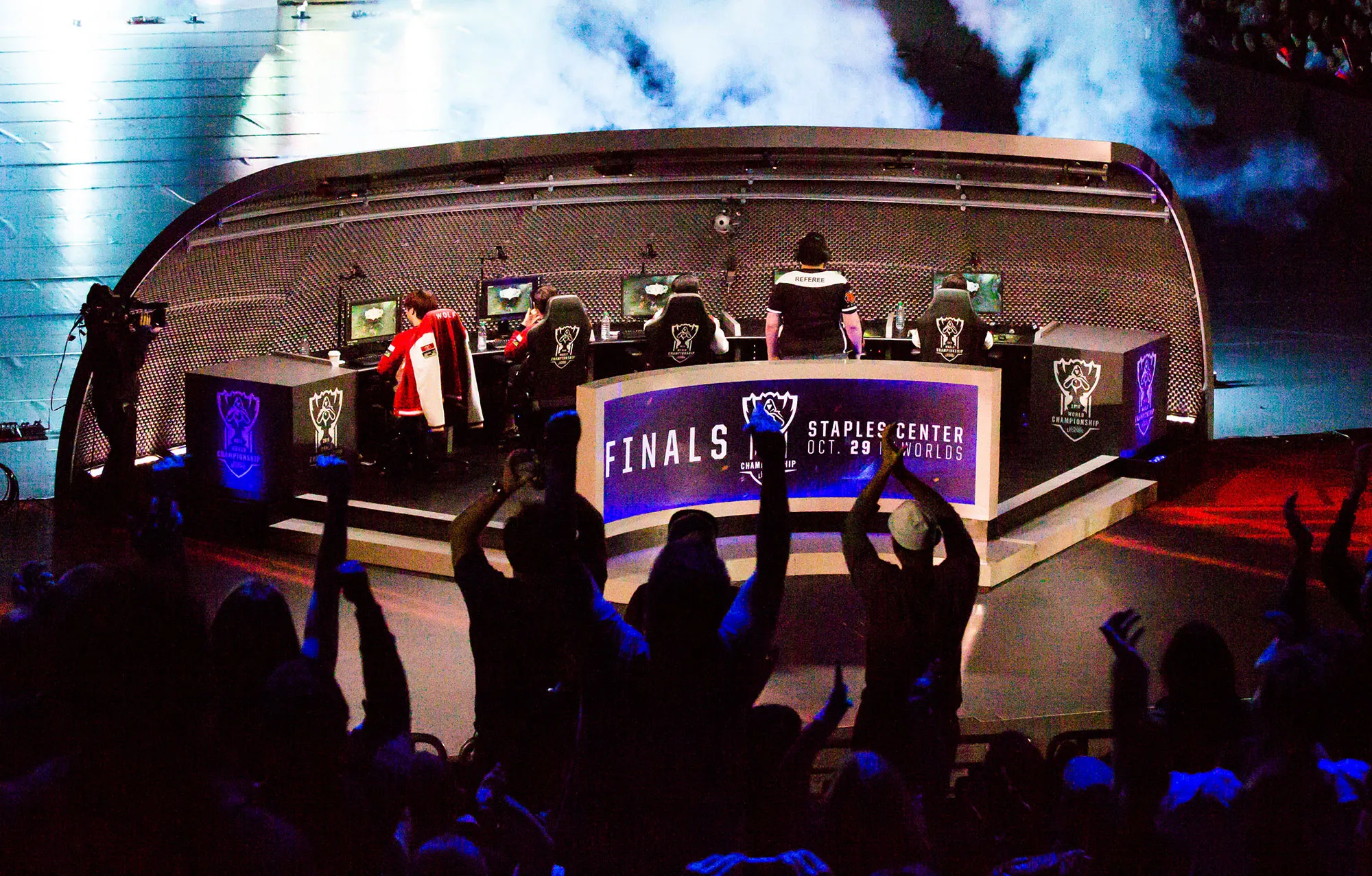 Fans cheer on a team during the League of Legends World Championship at the Staples Center in Los Angeles, California, on Oct. 29, 2016.
