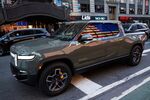 A Rivian R1T electric pickup truck during the company's IPO outside the Nasdaq MarketSite in New York, U.S., on Wednesday, Nov. 10, 2021.