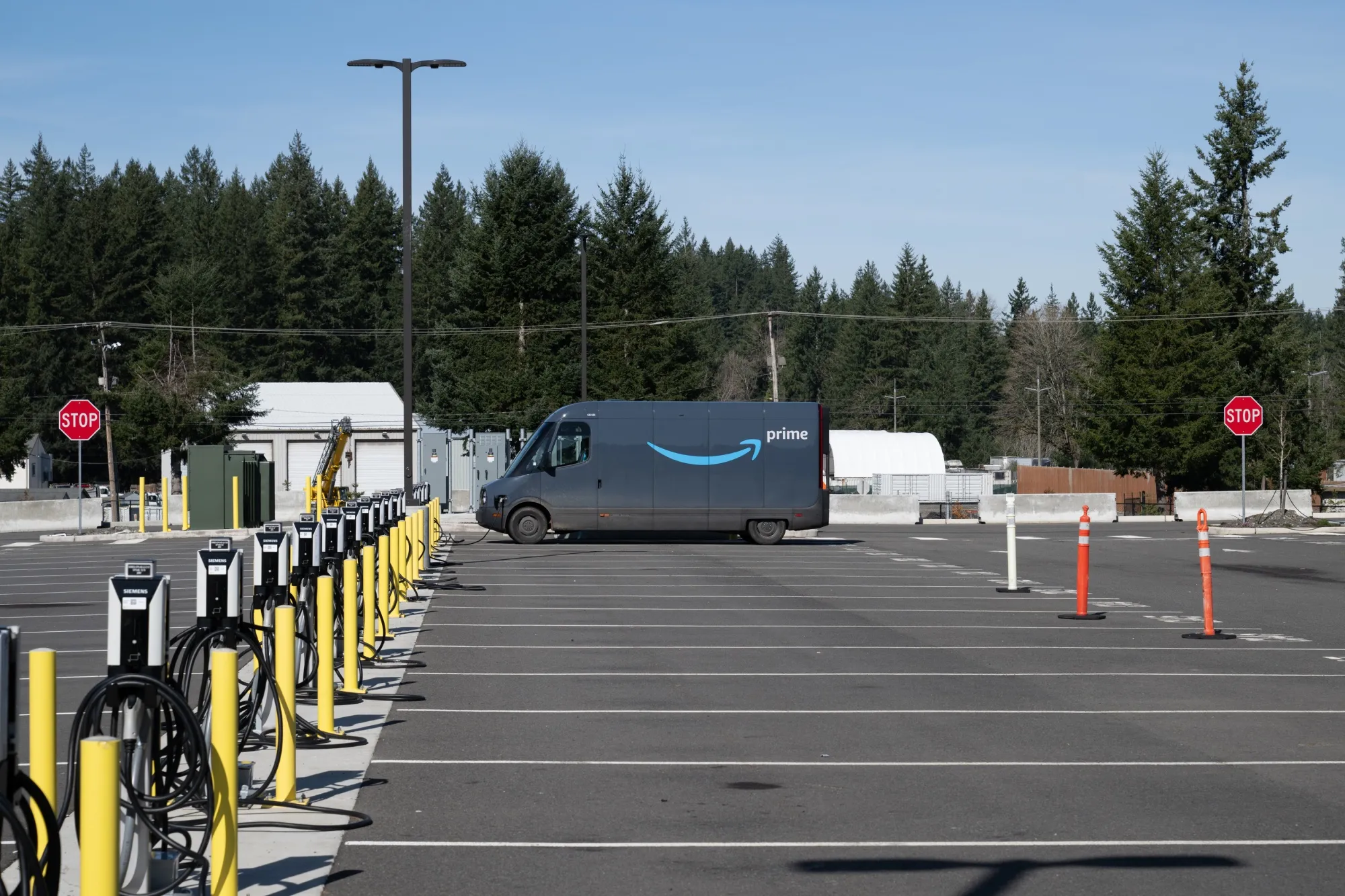 EV charging stations at an Amazon Delivery Station in Maple Valley.&nbsp;Amazon has installed more than 17,000 chargers at about 120 warehouses around the US.