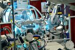 Robots weld a Volkswagen Passat at a factory in Chattanooga, Tenn.