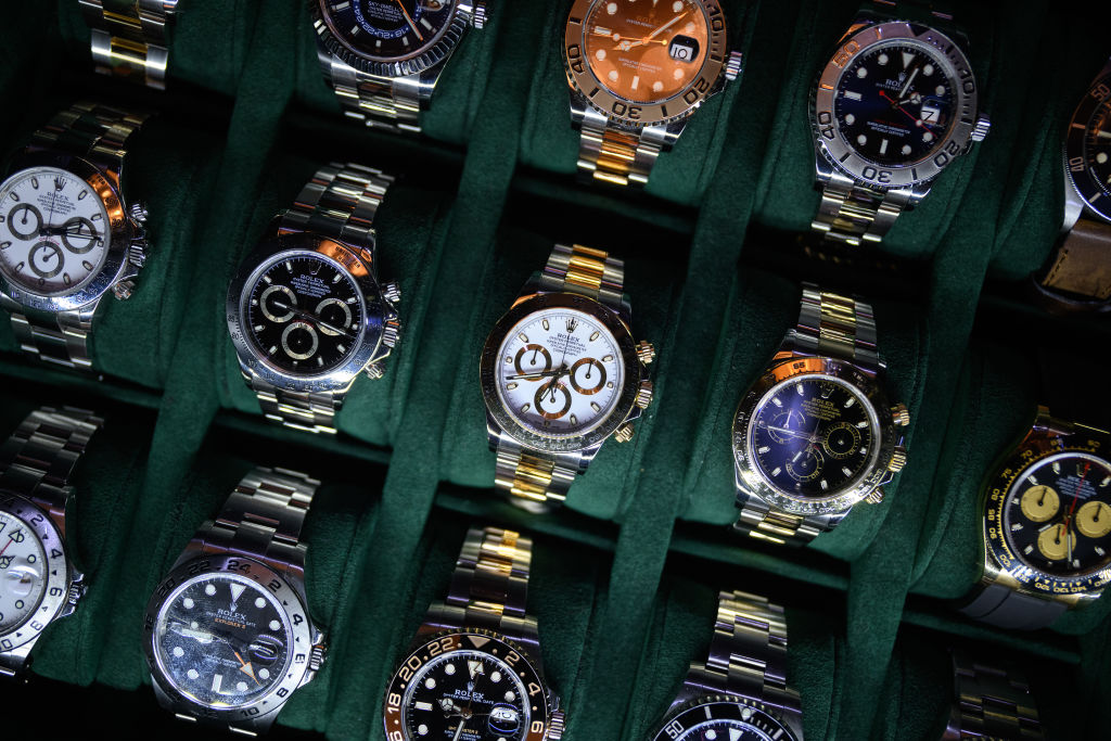 A tray of Rolex watches.