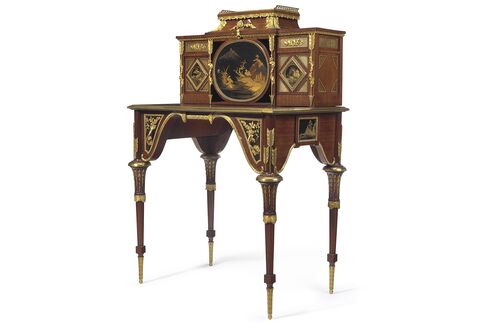 A French ormolu and Japanese lacquer-mounted mahogany bonheur du jour, circa 1880, estimated to sell for $25,000 to $35,000 at Christie's.