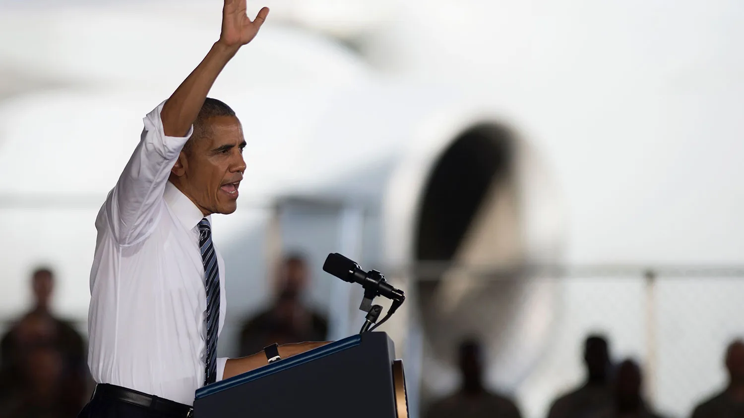 President Barack Obama waves as he speaks to service members at the Naval Station Rota in southwestern Spain on July 10, 2016.
