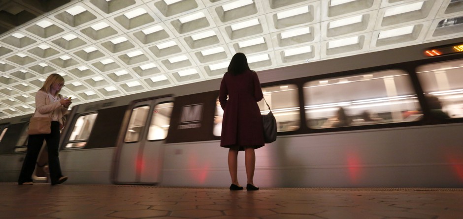 Riders wait to board a Metro train in Washington, D.C.
