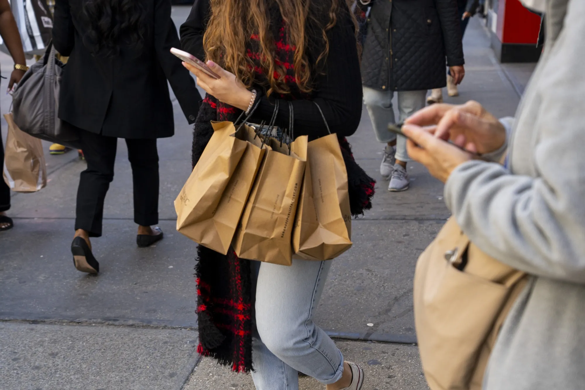 The negative effect of the Fed's rate increases could be blunted by consumers' willingness to spend.