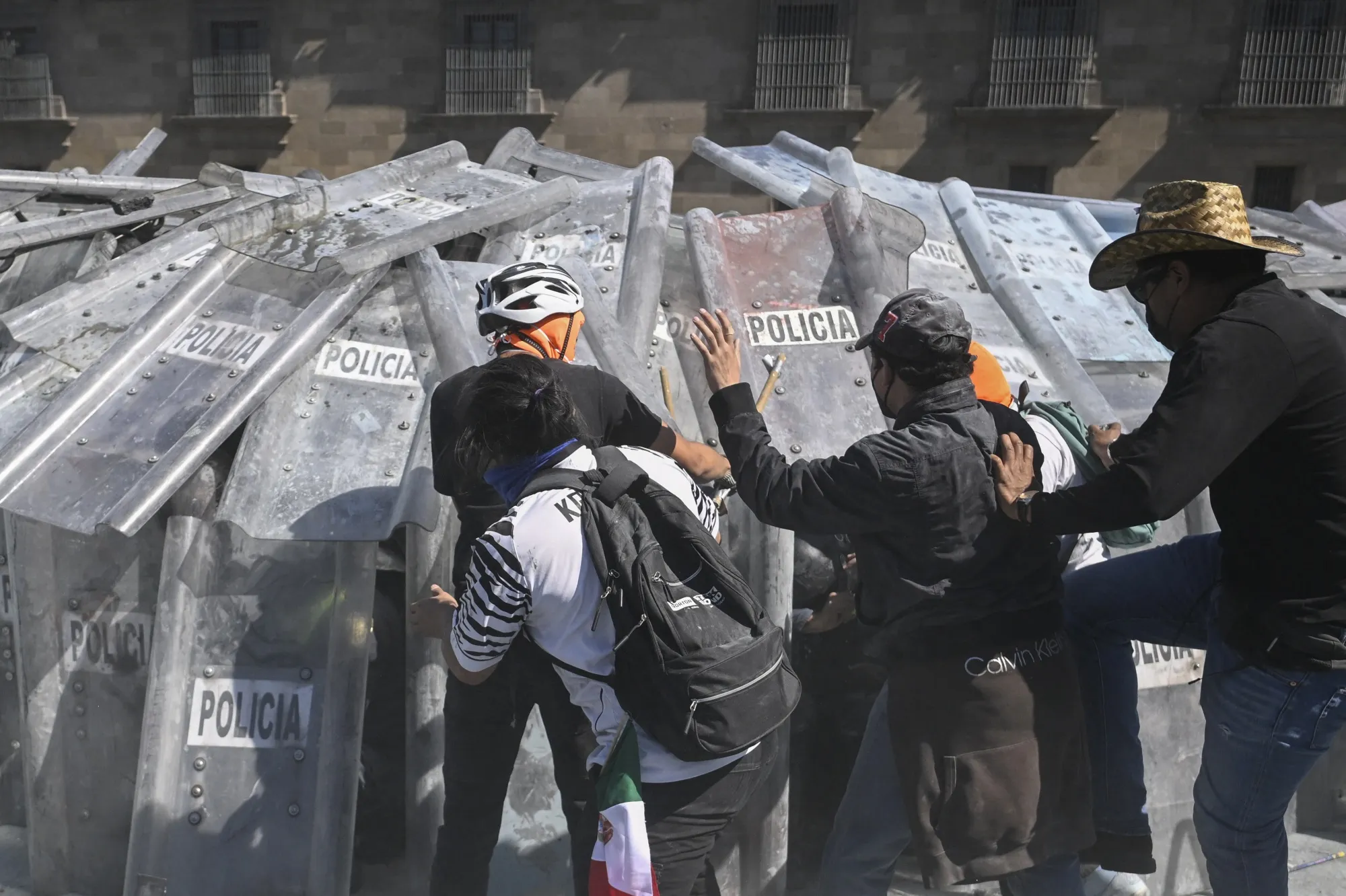 Demonstrators clash with riot police during a rally against the government of Mexico's President Claudia Sheinbaum at Zocalo Square in Mexico City on Nov. 15.