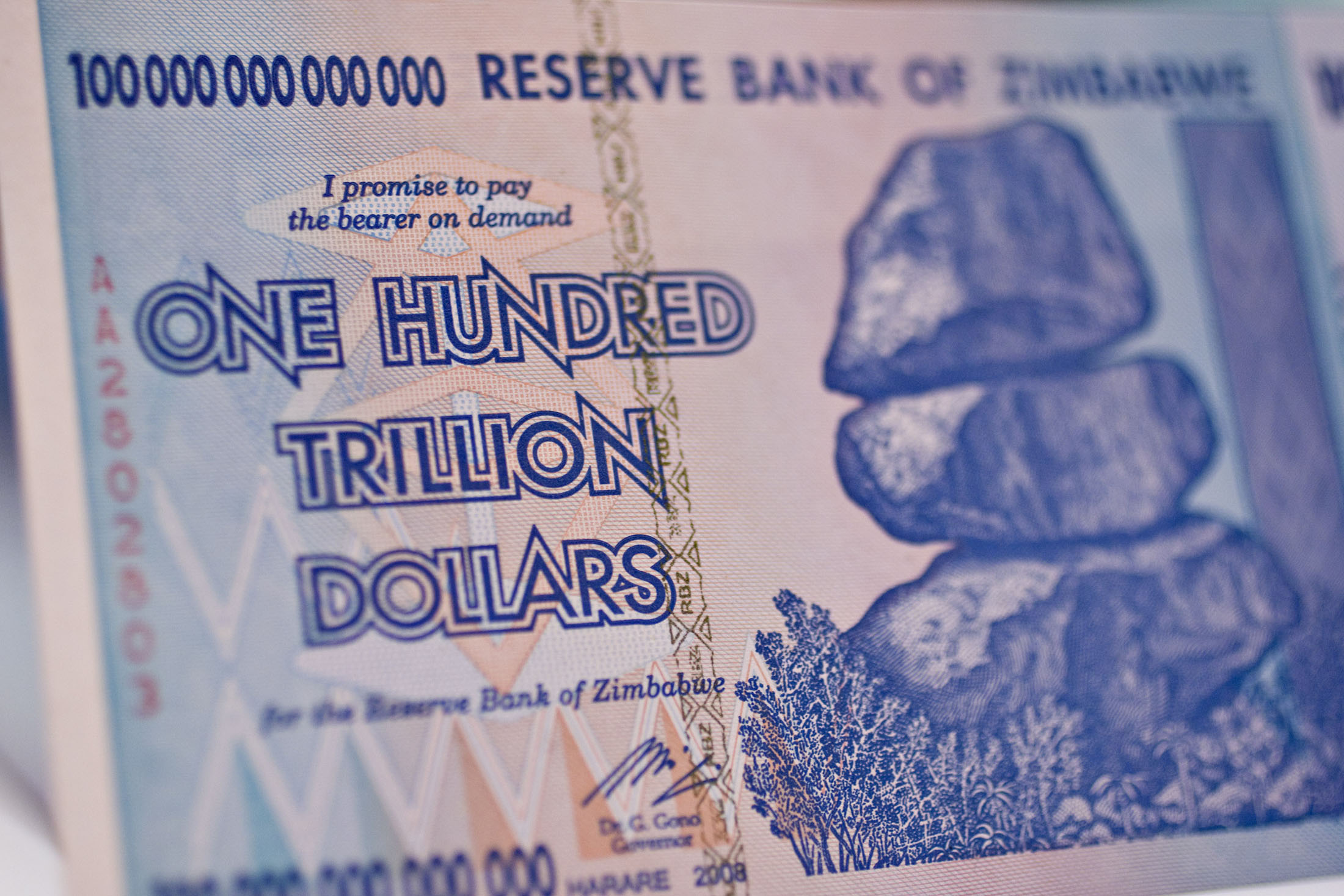 A one hundred trillion dollar Zimbabwe note issued in 2008.
