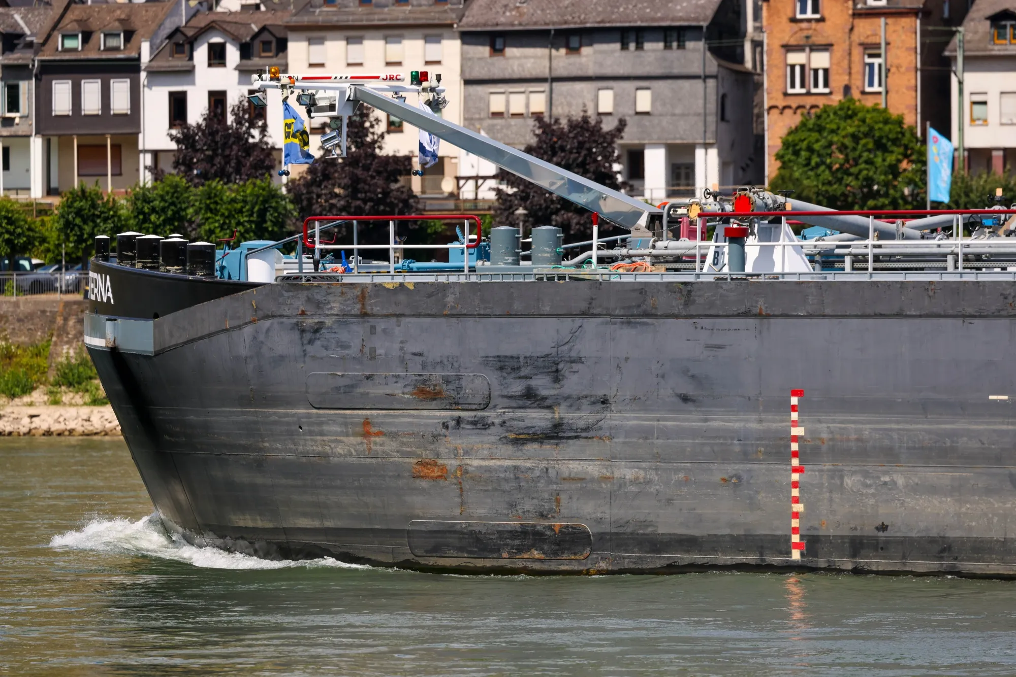 As water levels drop, on the River Rhine, so does the volume of goods barges are able to carry.