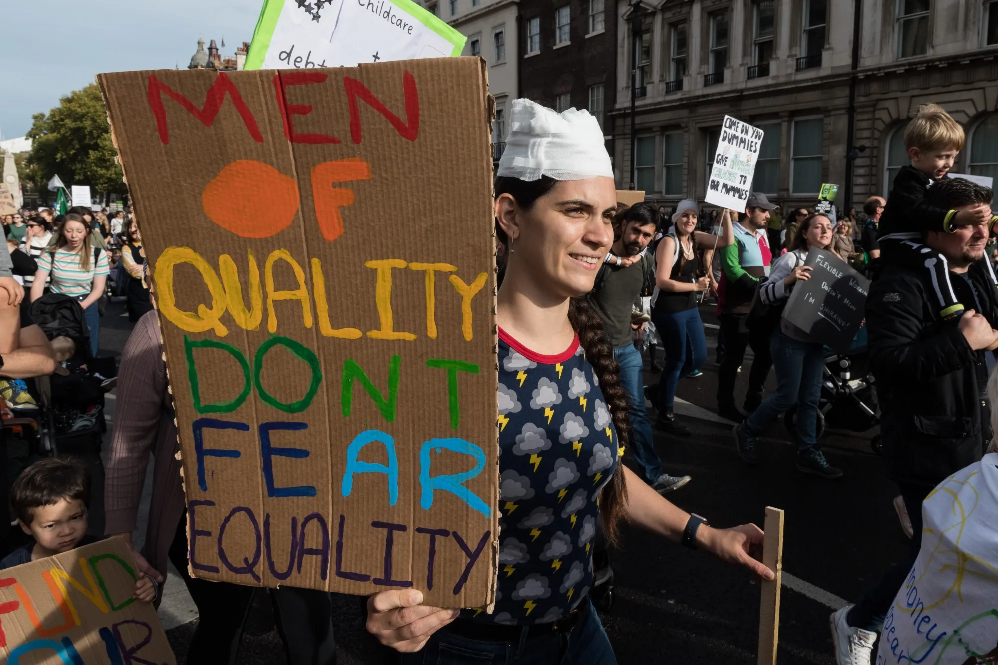 A 2022 march in London demanding reforms on child care, parental leave and flexible working.