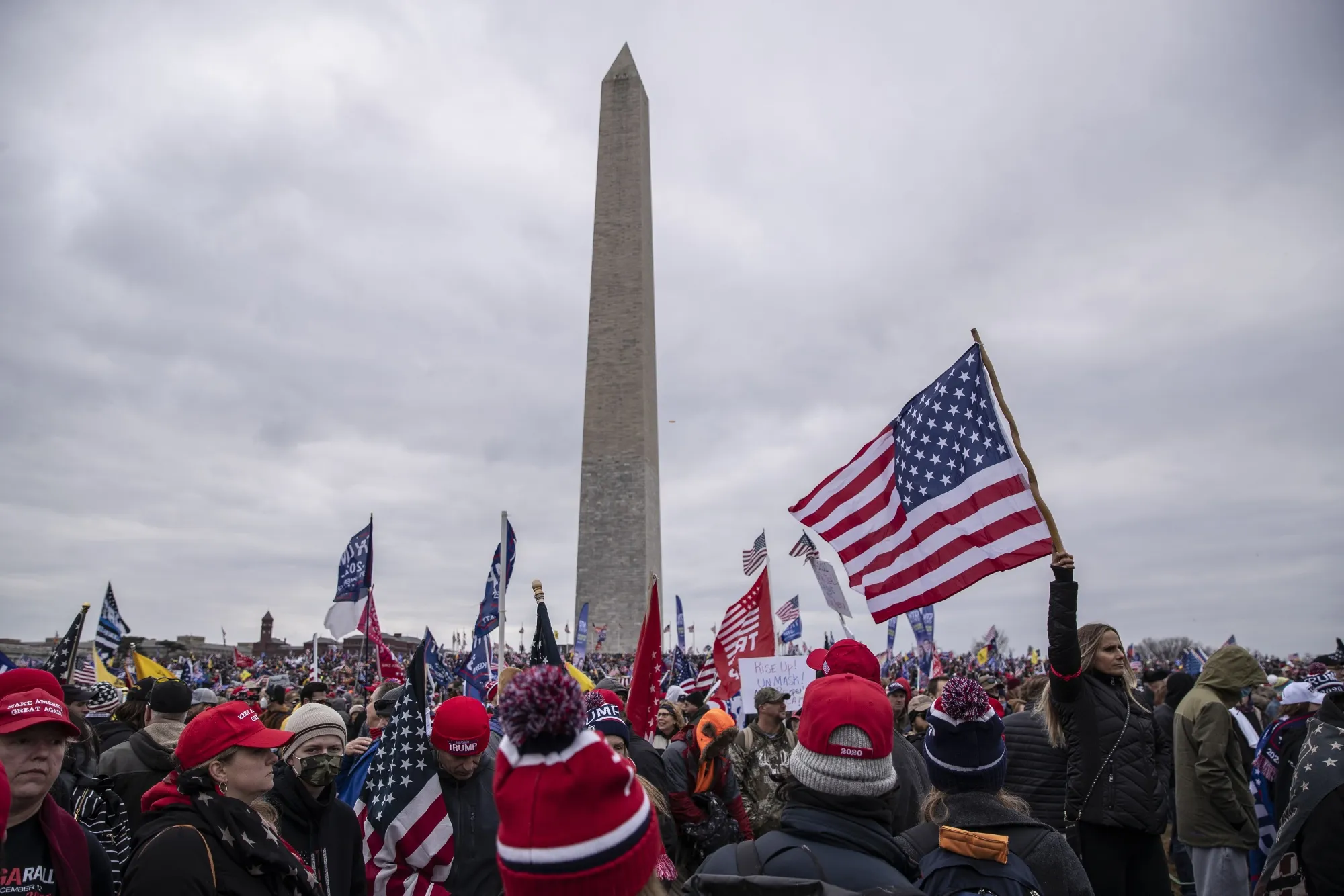 Demonstrators gather during a protest at the Washington Monument on Jan. 6.
