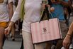 A shopper with a Victoria's Secret bag.