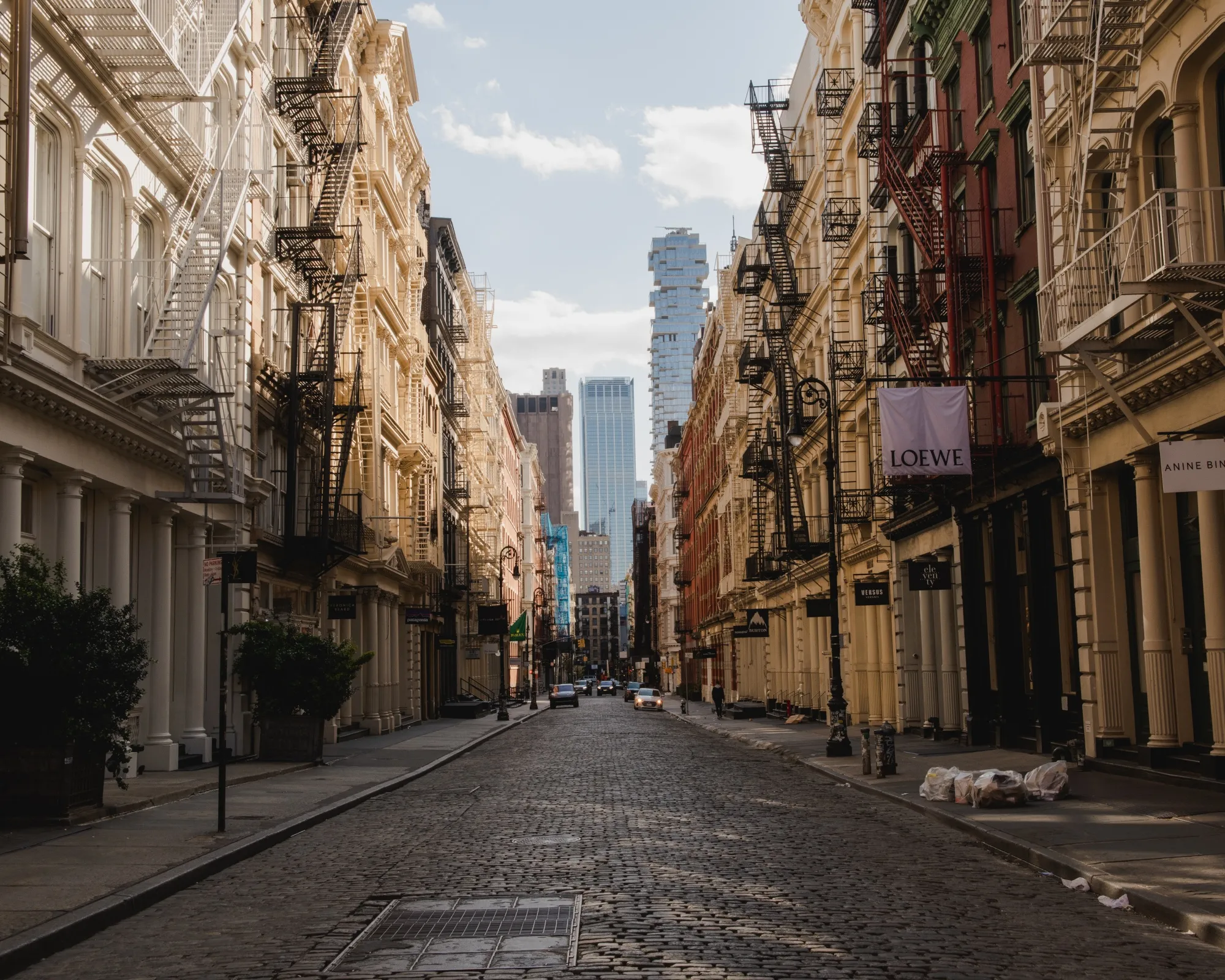 Retail stores stand closed along Greene Street in the Soho neighborhood of New York on April 11.