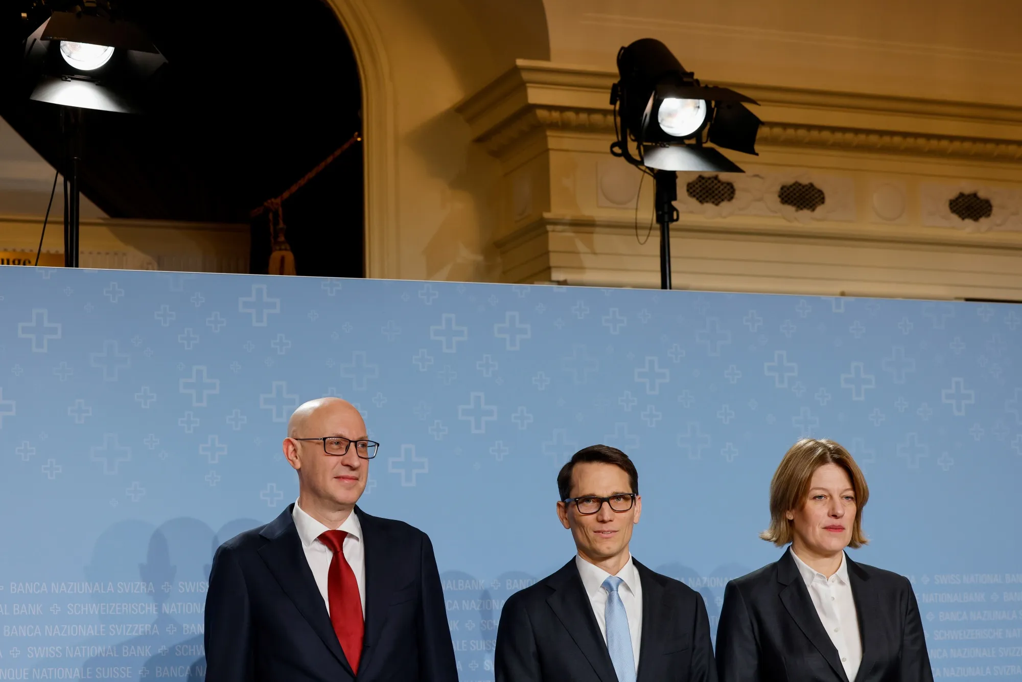 Antoine Martin, board member of the Swiss National Bank (SNB), Martin Schlegel, president of the Swiss National Bank (SNB), Petra Tschudin, board member of the Swiss National Bank (SNB), left to right, at the bank's rate announcement news conference in Bern, Dec. 12.