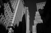 Buildings stand on Wall Street near the New York Stock Exchange (NYSE) in New York, U.S., on Monday, Feb. 22, 2016. Stocks retreated with government bonds, while the euro rallied to the highest level in almost a month as investors looked past an unprecedented boost from European monetary policy to focus on rising anxiety that policymakers have lost the ability to jumpstart global growth and stave off deflation.