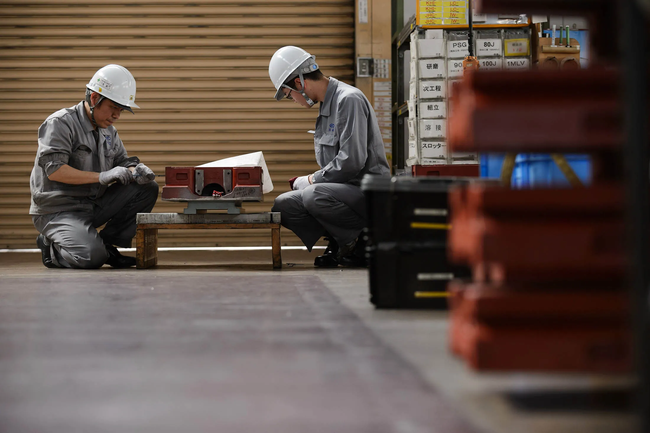 Employees work at a machine factory in Osaka, Japan. Production rose 1 percent in September from August, when it dropped 1.2 percent, the trade ministry said on Thursday.
