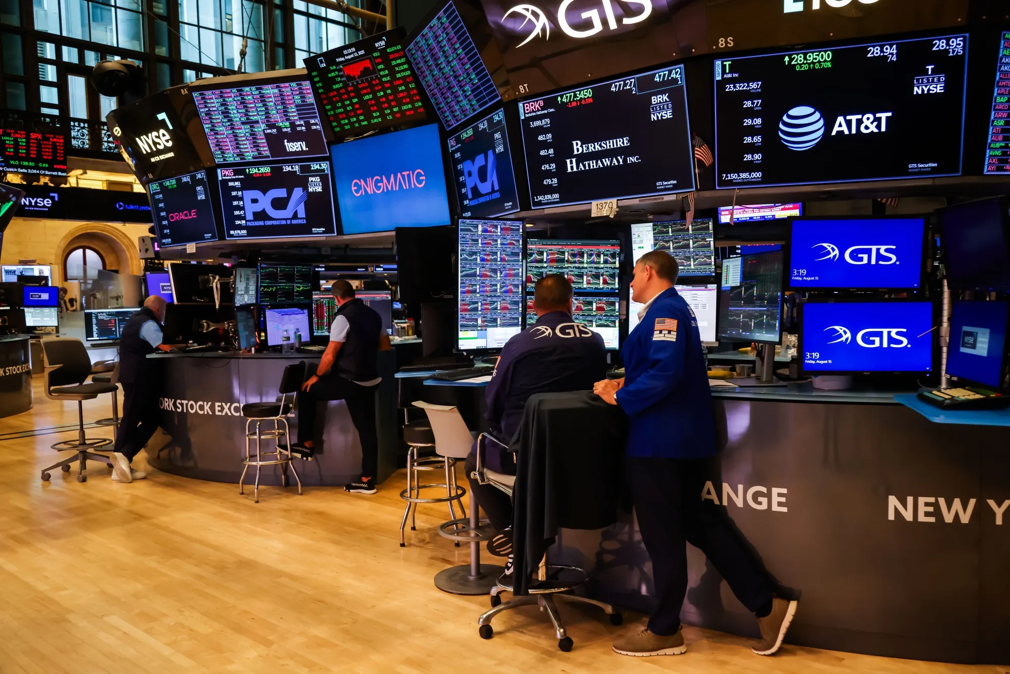 Traders work on the floor of the New York Stock Exchange.