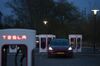 A Tesla Inc. Model 3 electric automobile stands charging at dusk at a Tesla Supercharger station in Breukelen, Netherlands, on Monday, April 1, 2019. With 5,315 new cars registered, Tesla’s Model 3 accounted for 29 percent of the new sales.