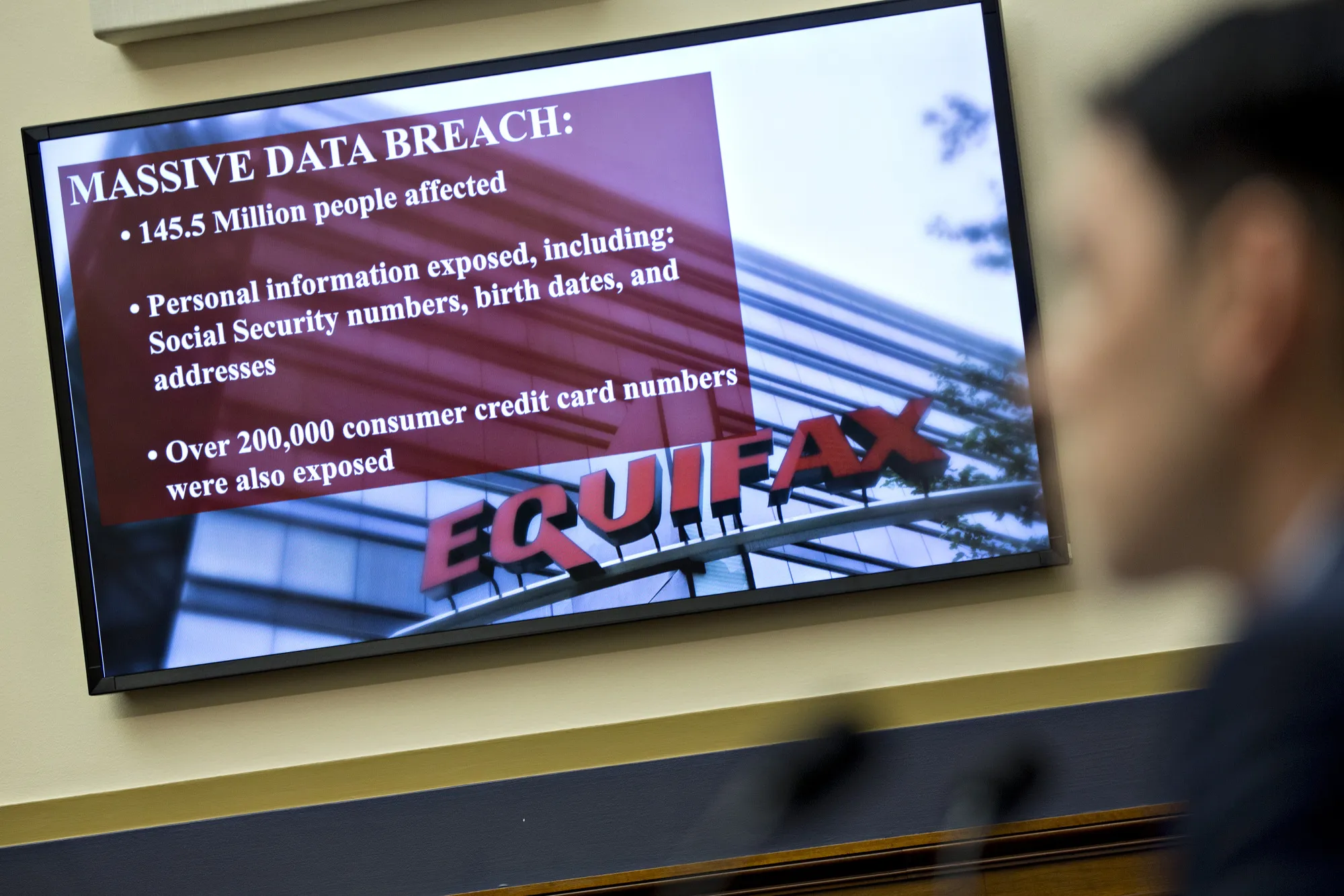 An Equifax Inc. slide is displayed on a monitor during a House Financial Services Committee hearing in Washington, D.C., on Oct. 25, 2017.&nbsp;