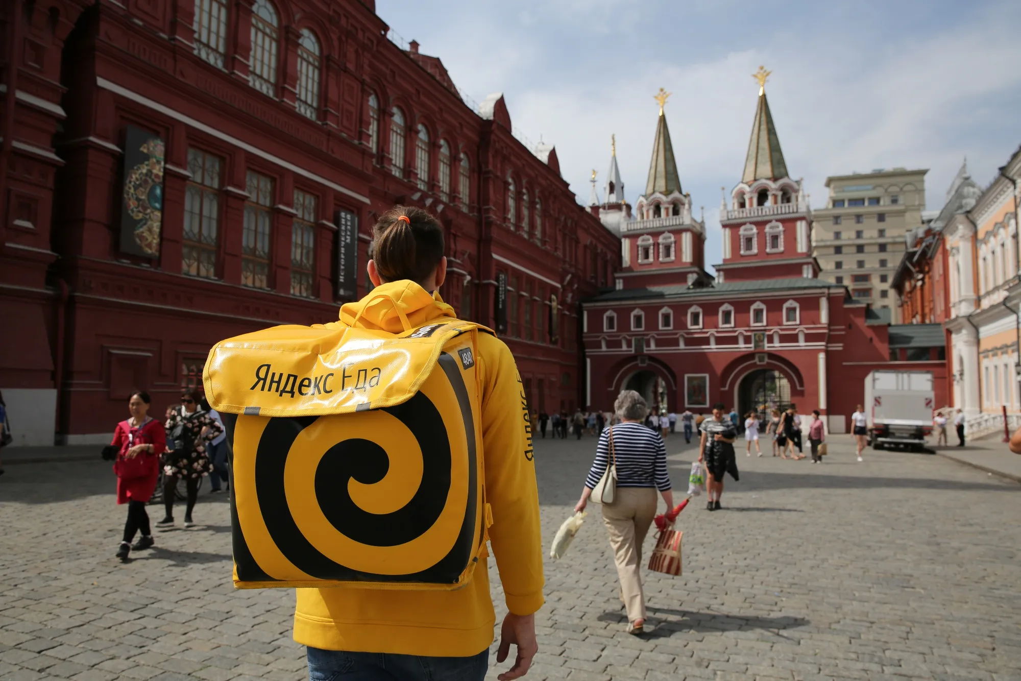 A courier for the food delivery service Yandex.Eats in Moscow, Russia.