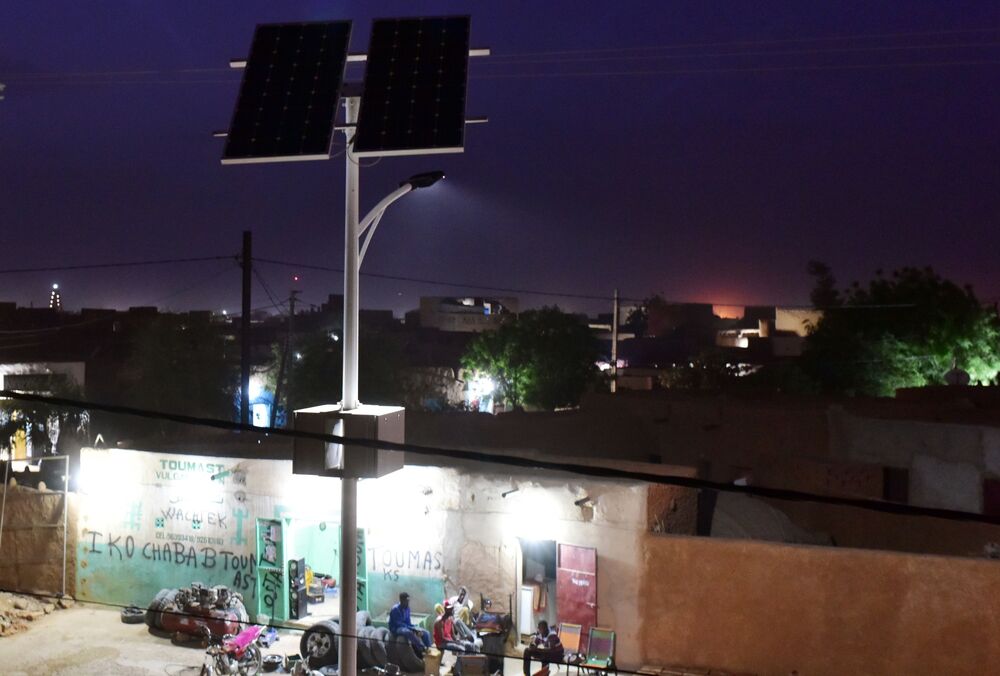 Solar powered street light in an African neighborhoods