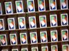 Apple Inc. iPhone X smartphones are displayed during the sales launch at a store in New York, U.S., on Friday, Nov. 3, 2017. The $1,000 price tag on Apple Inc.'s new iPhone X didn't deter throngs of enthusiasts around the world who waited -- sometimes overnight -- in long lines with no guarantee they would walk out of the store with one of the coveted devices.