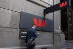 A pedestrian walks past a Westpac Banking Corp. branch in Sydney, Australia.