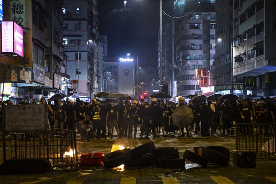 Police Call for Hong Kong Curfew as Shooting of Protester Sparks Fury