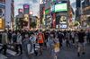 TOKYO, JAPAN - JUNE 23: People walk through Shibuya on June 23, 2020 in Tokyo, Japan. Restrictions on businesses in Tokyo were fully lifted recently as the Covid-19 coronavirus outbreak continues to abate. Japans Foreign Minister announced today that travel from Japan to Vietnam will partially resume this week as both countries aim to ease travel restrictions imposed to tackle the spread of coronavirus. (Photo by Carl Court/Getty Images)