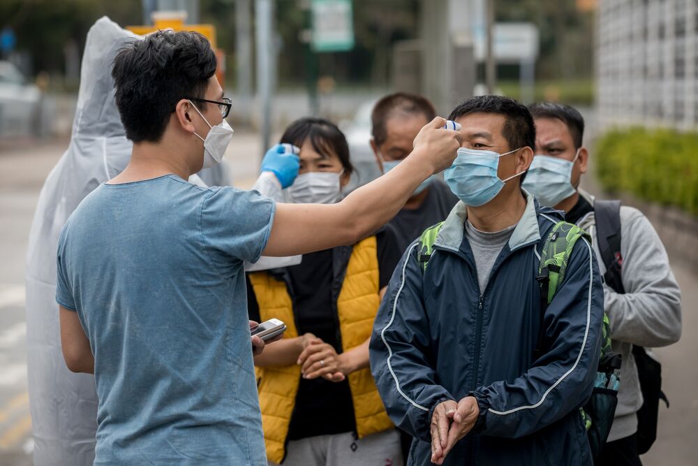 Hong Kong Will Quarantine Travelers Coming From Mainland China - Bloomberg
