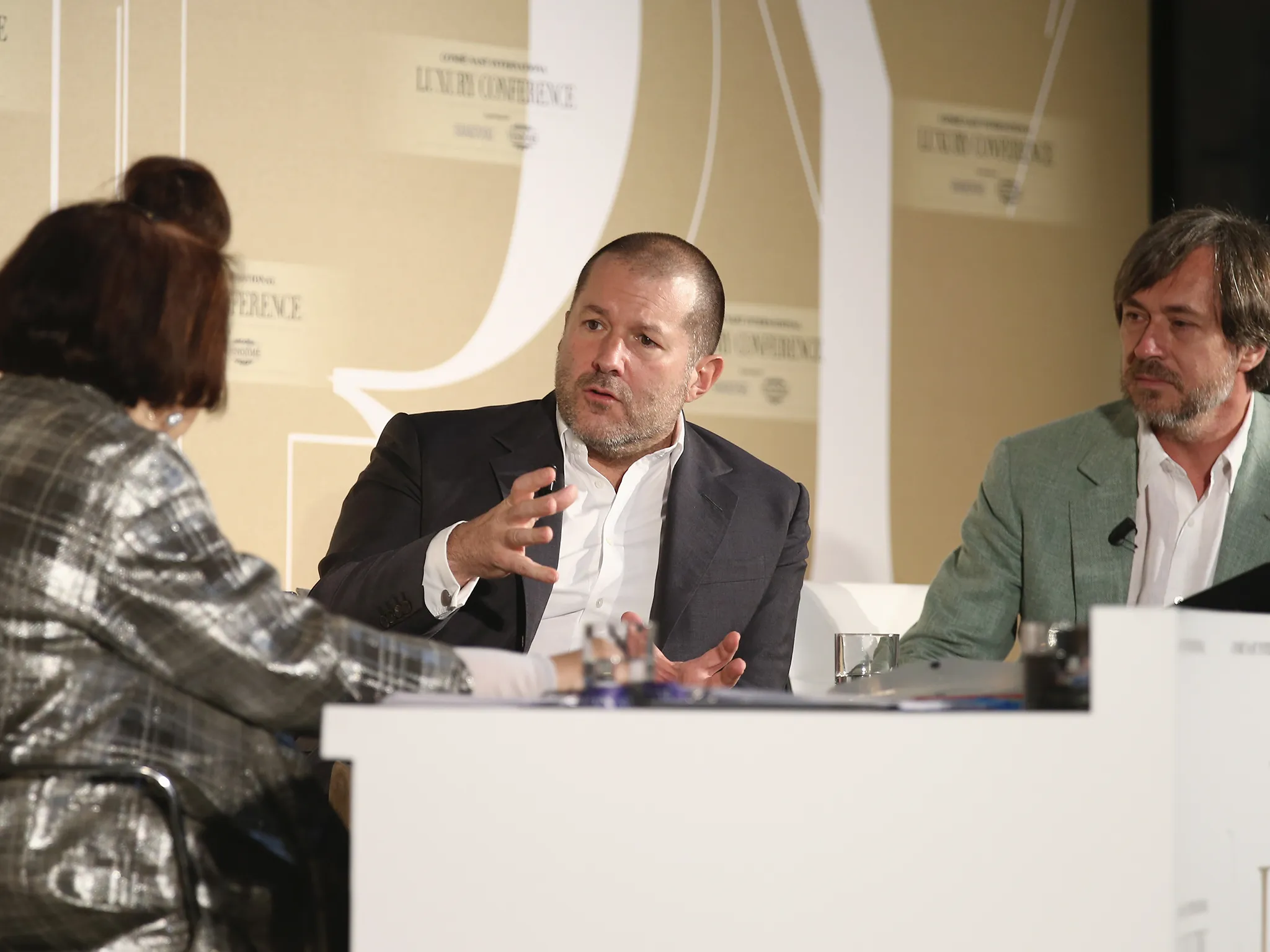 (L-R) International Vogue Editor Suzy Menkes, Apple's vice president of design, Jonathan Ive, and designer Marc Newson attend the Condé Nast International Luxury Conference at Palazzo Vecchio on April 22, 2015, in Florence, Italy.
