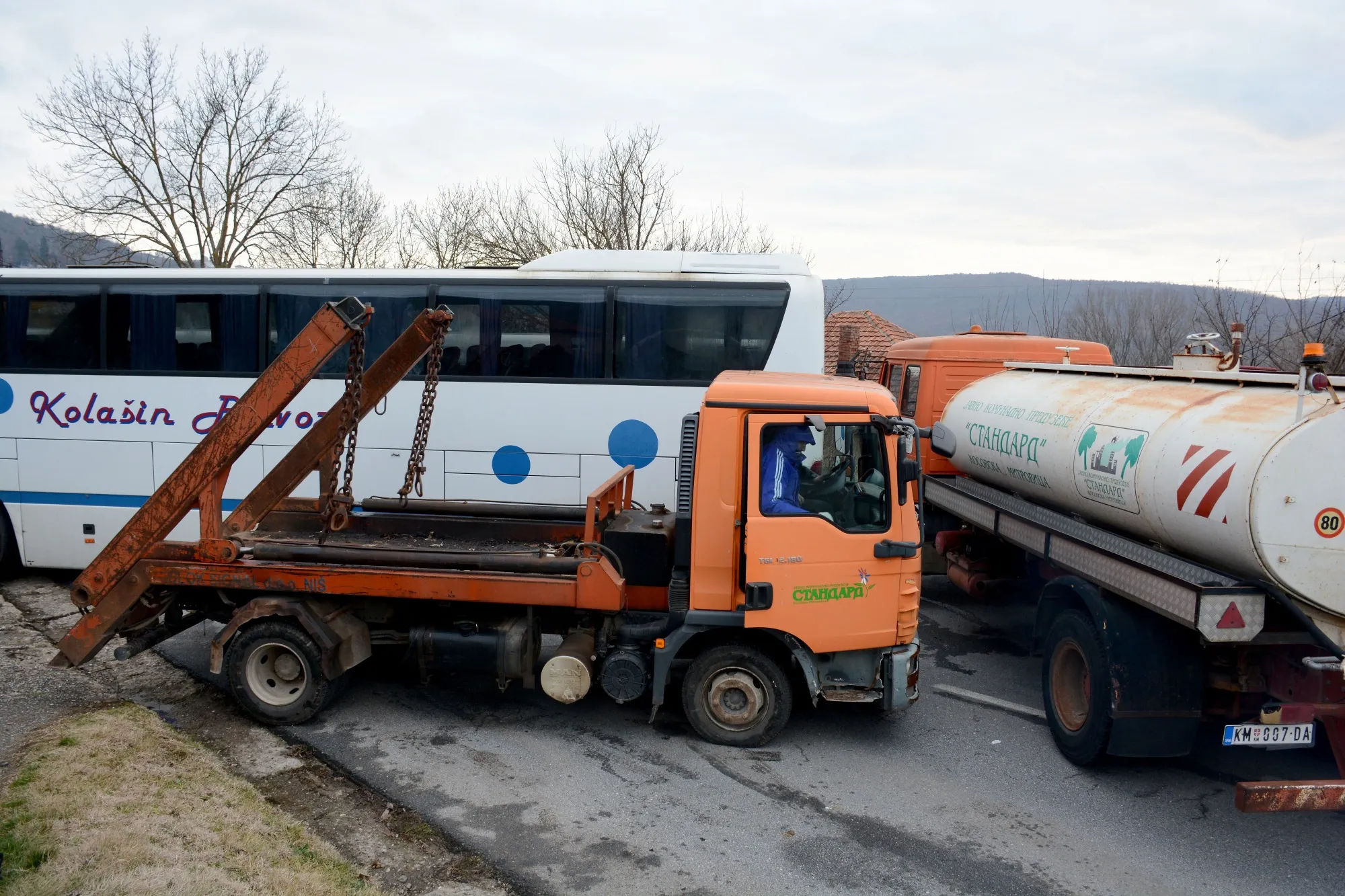 A truck is removed from a road block near the town of Zvecan in Kosovo on Dec. 29, 2022.
