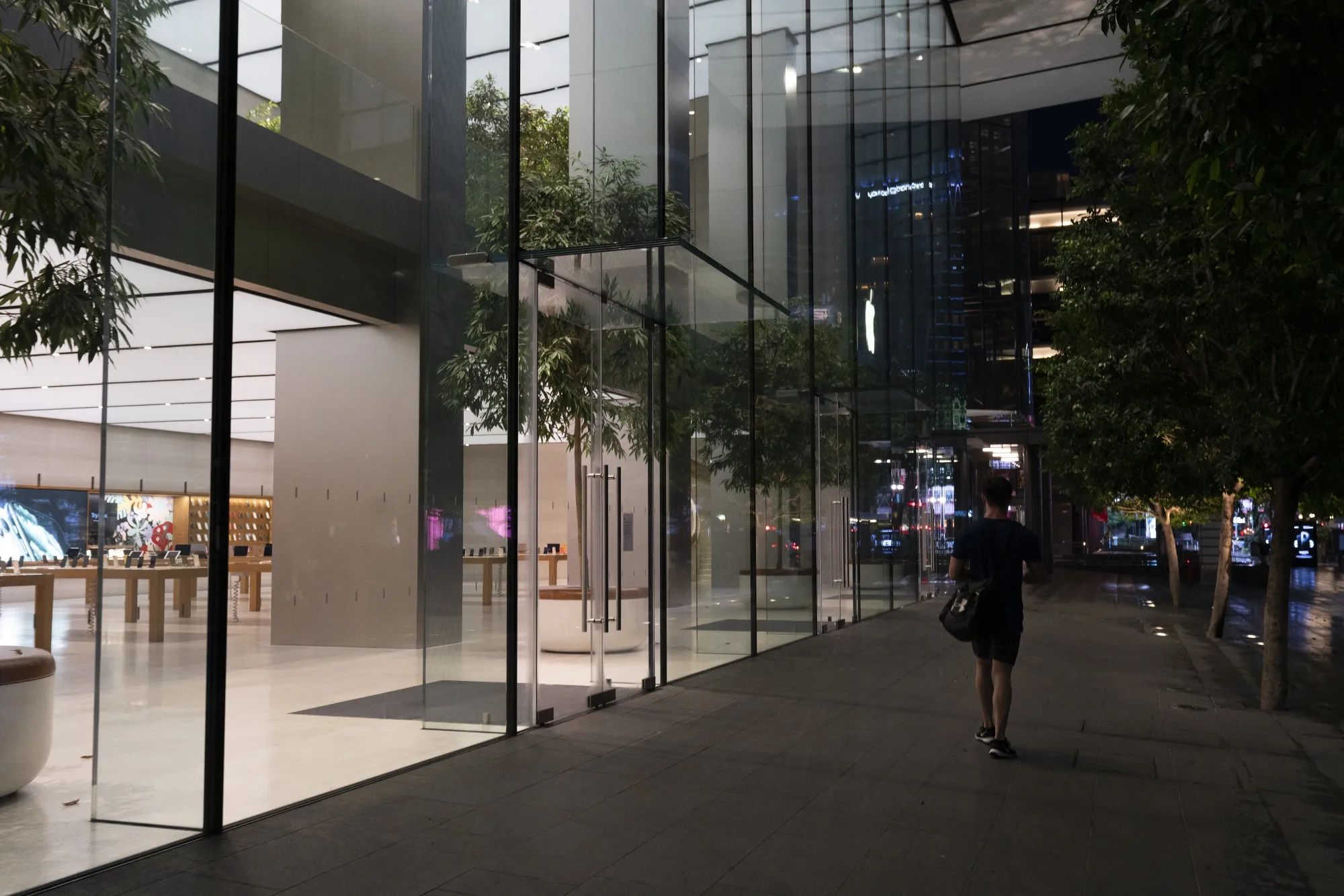 A pedestrian passes through a shopping district during a partial lockdown in Singapore on April 7.