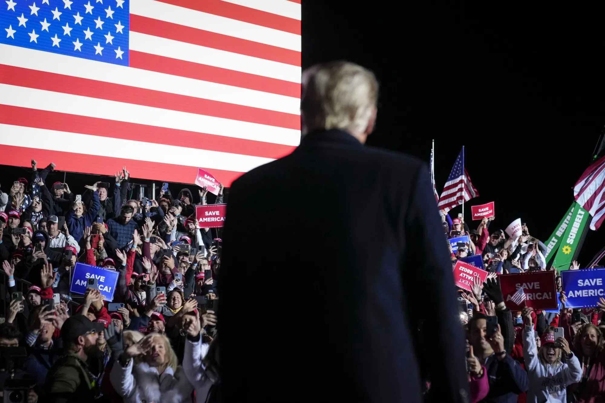 Donald Trump arrives onstage to cheering supporters at a rally for Ohio Republicans in Vandalia, Ohio, on Nov. 7.