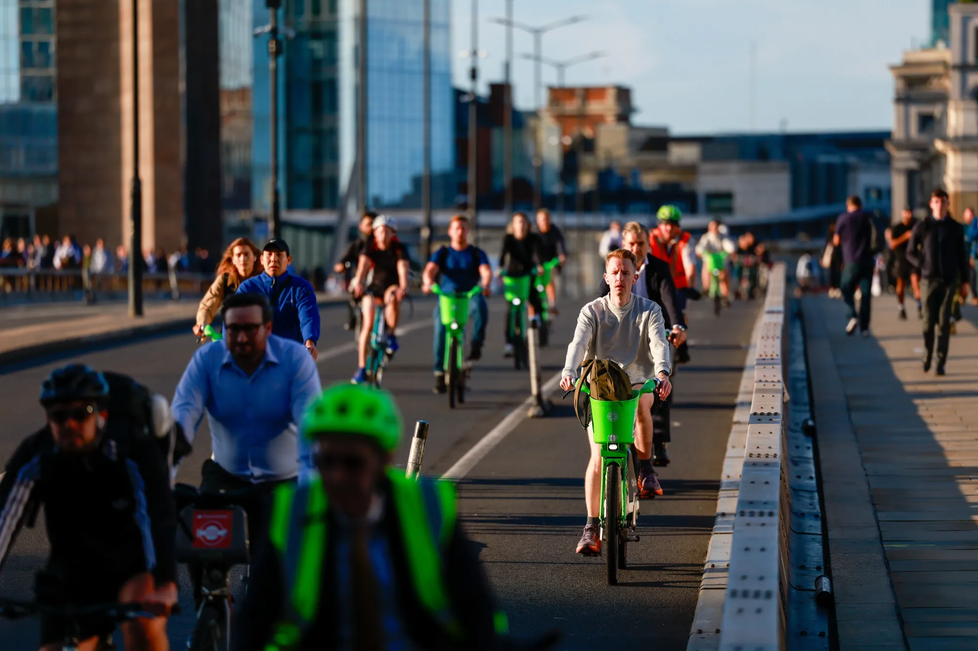 Commuters cycle across London Bridge on Sept. 8.