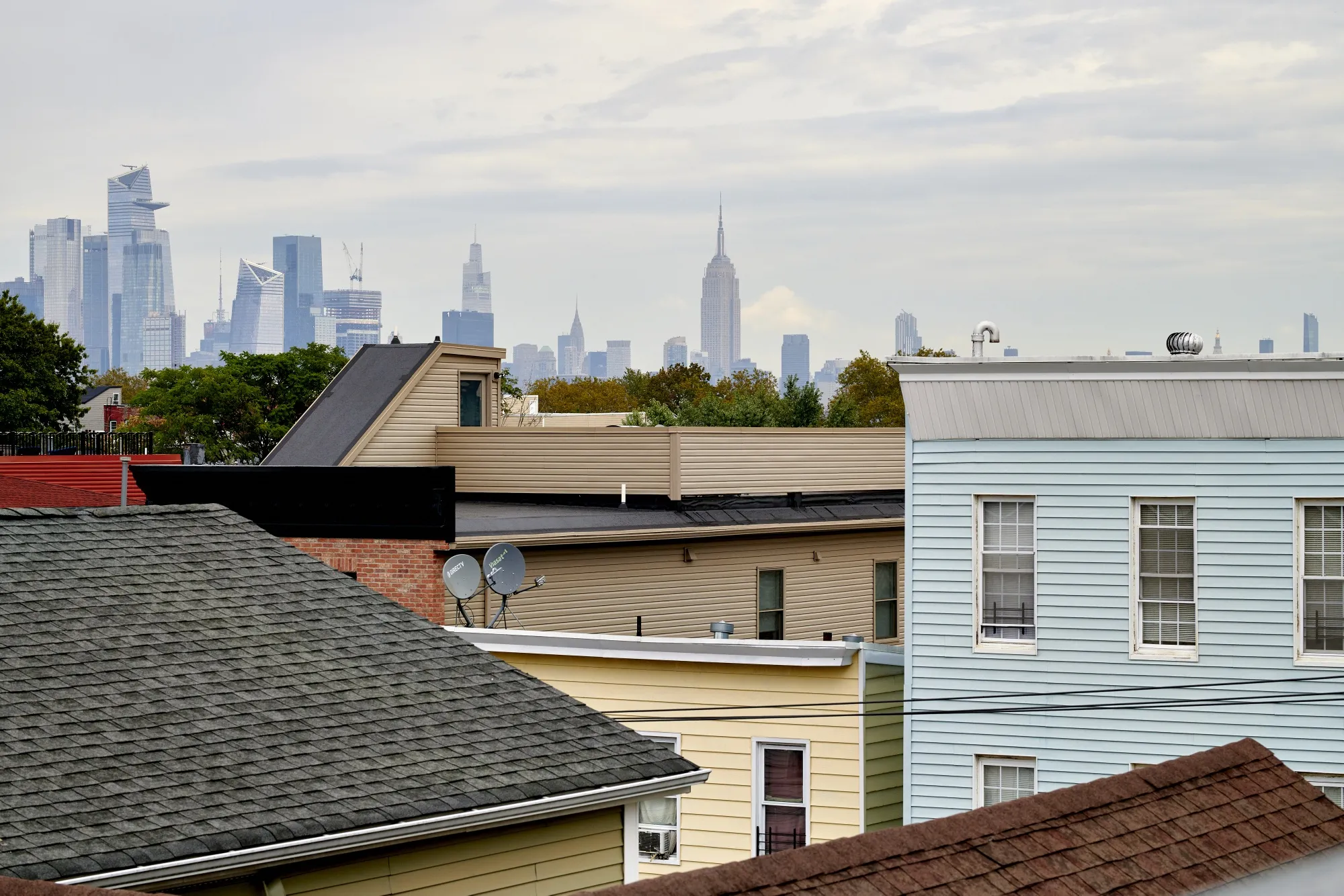The New York skyline behind homes in Jersey City, New Jersey.