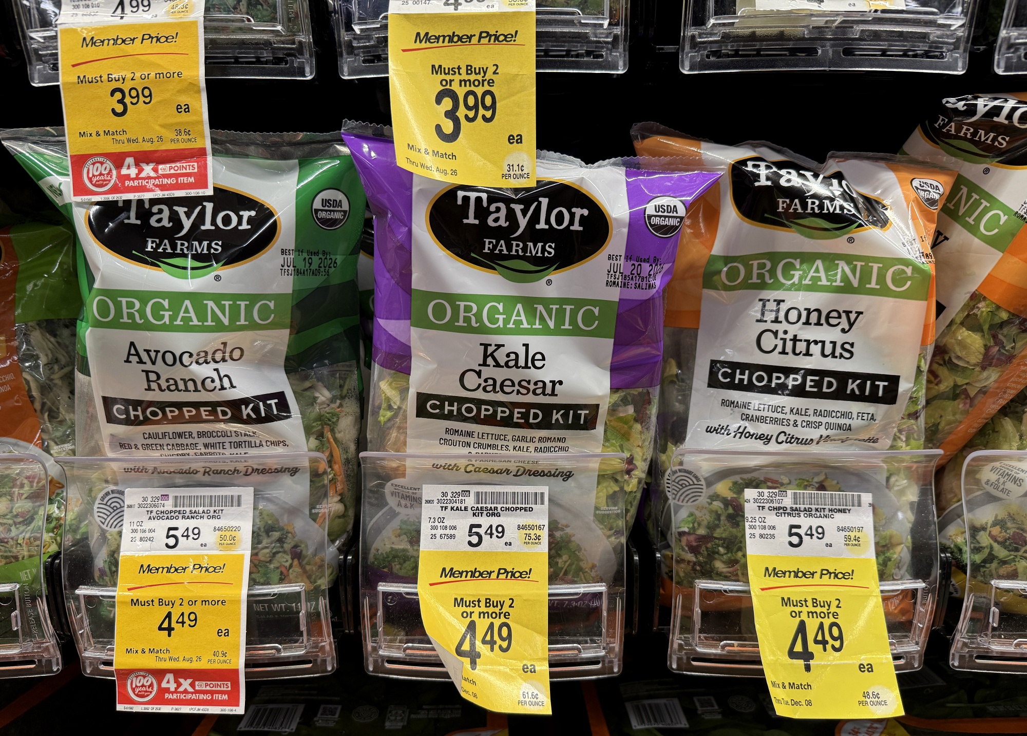 Packages of Taylor Farms salad greens