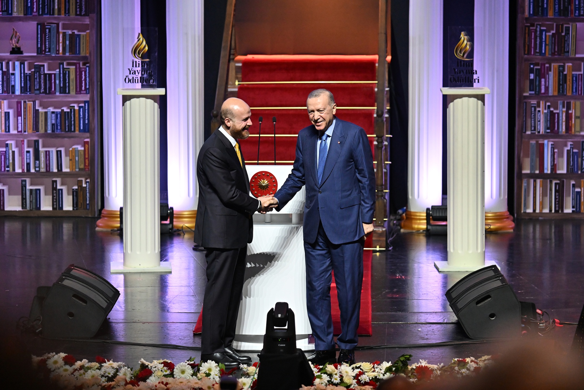  Recep Tayyip Erdogan shakes hands with son Bilal Erdogan during the Science Dissemination Awards Event at Ataturk Cultural Center in Istanbul, on Nov. 29. Photographer: Terli/Anadolu/Getty Images