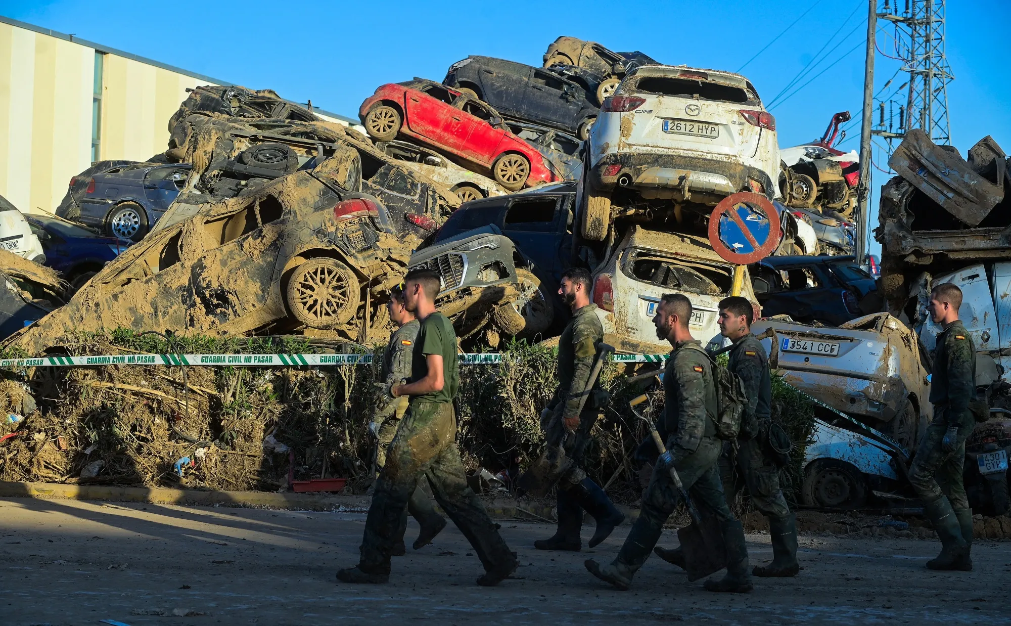 Spanish soldiers during the clean-up after extreme flooding in Paiporta, near Valencia, eastern Spain, in 2024.