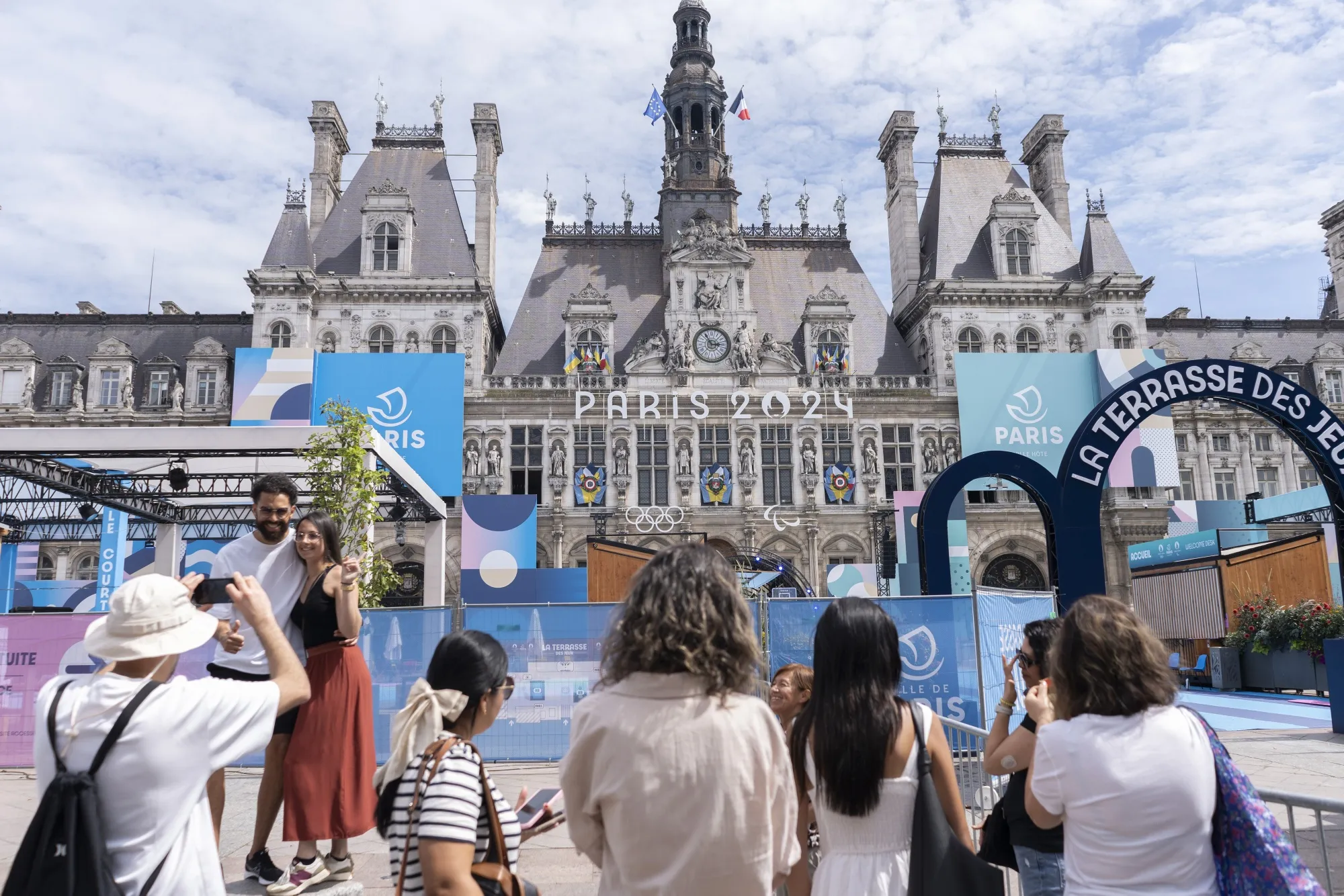 Visitors in the Hotel de Ville fan zone ahead of the Olympic Games in central Paris.