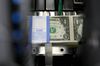 Operations At The Bureau Of Engraving And Printing As The $1 Bill Is Printed