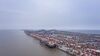 A Mediterranean Shipping Co. (MSC) container ship is moored at the Yangshan Deep Water Port in this aerial photograph taken in Shanghai, China, on Tuesday, Feb. 4, 2020. Chinese officials are hoping the U.S. will agree to some flexibility on pledges in their phase-one trade deal, people familiar with the situation said, as Beijing tries to contain a health crisis that threatens to slow domestic growth with repercussions around the world.