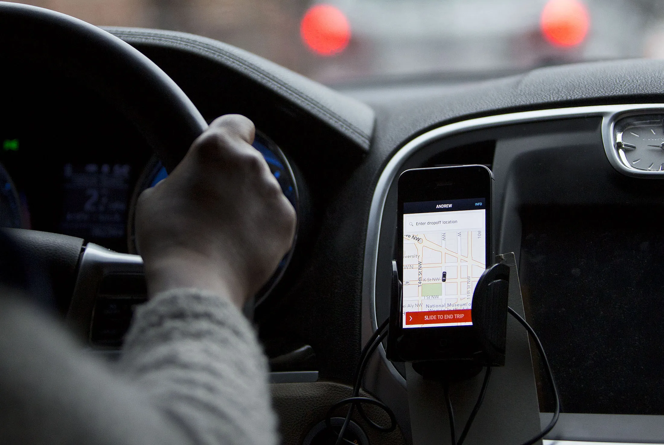 The Uber Technologies Inc. application runs on an Apple Inc. iPhone during an Uber ride in Washington.a
