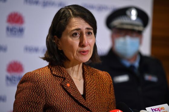 Morrison Urges Australians to Exit Covid ‘Cave’ When Shots Rise