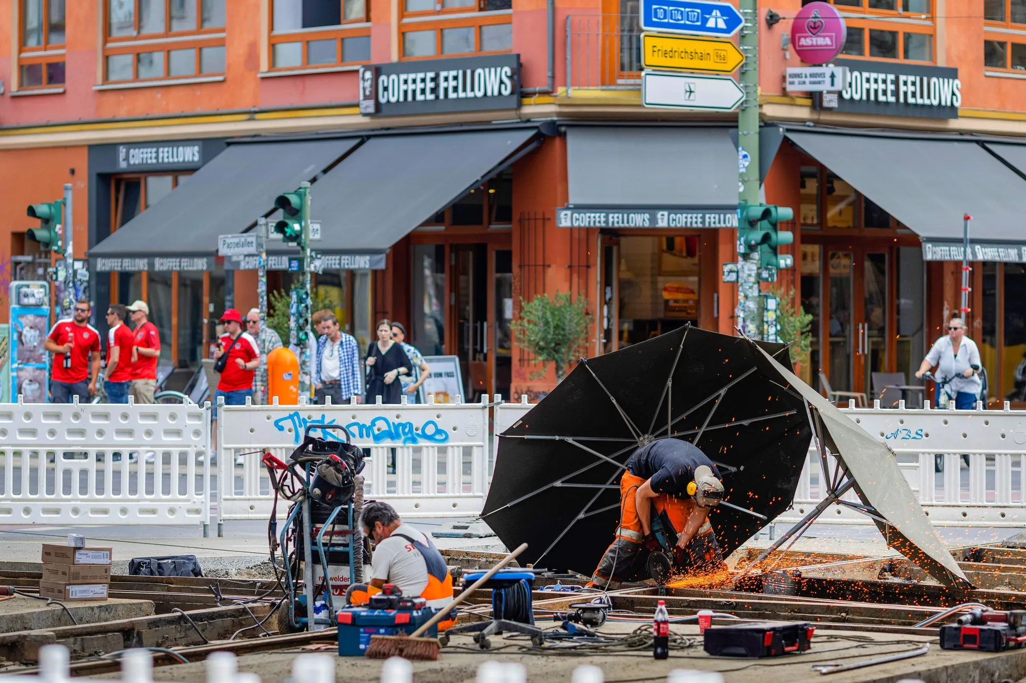 Workers maintain tram lines in Berlin.