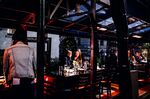 Customers dine outside at a restaurant in New York.