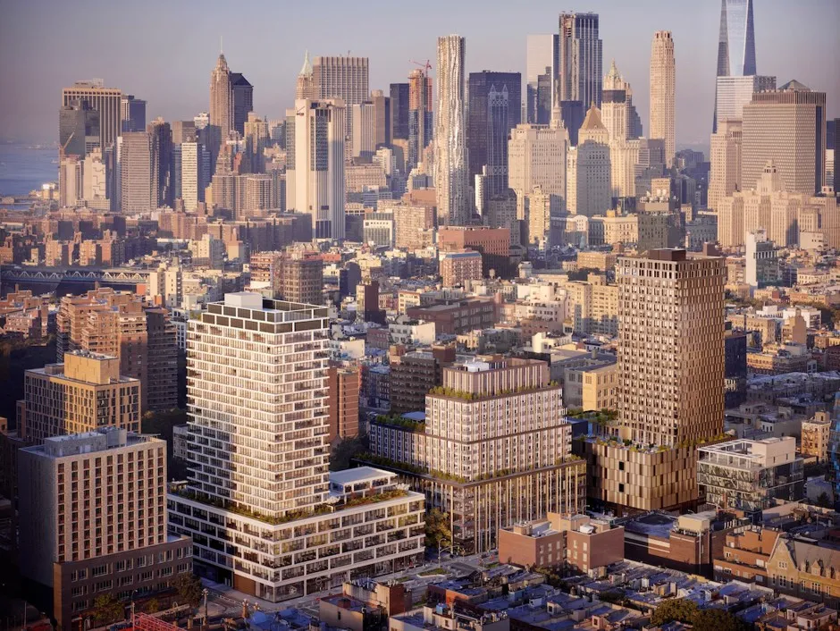 A rendering of Essex Crossing as seen from the air. From left to right: the Frances Goldin Senior Apartments; behind the Goldin and perpendicular to it, the Rollins, an apartment building; two mixed-use buildings (not yet completed); and the Essex, which houses the new Essex Market.