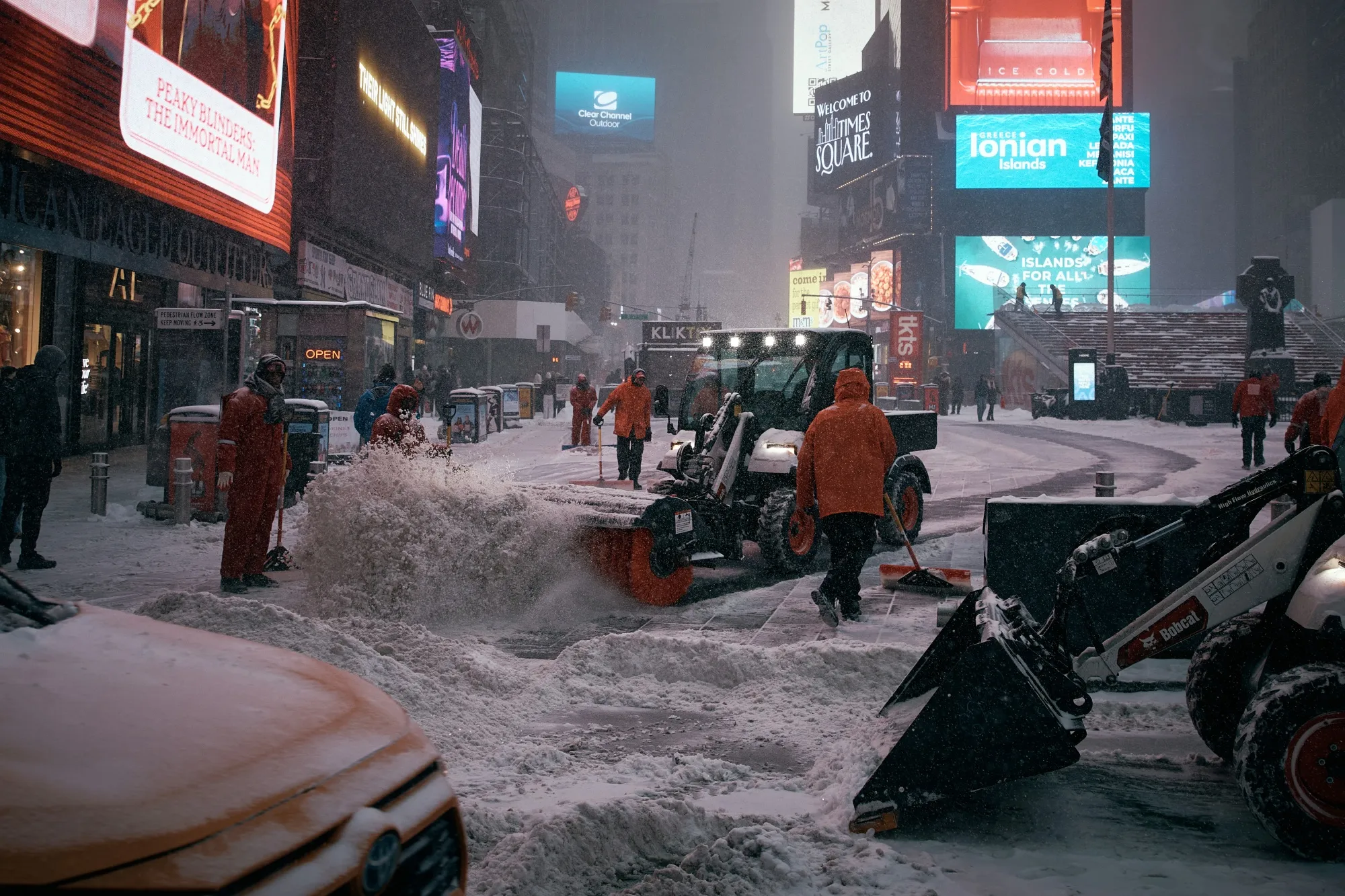 Workers clear Times Square during a snowstorm&nbsp;in New York on Jan. 25.&nbsp;