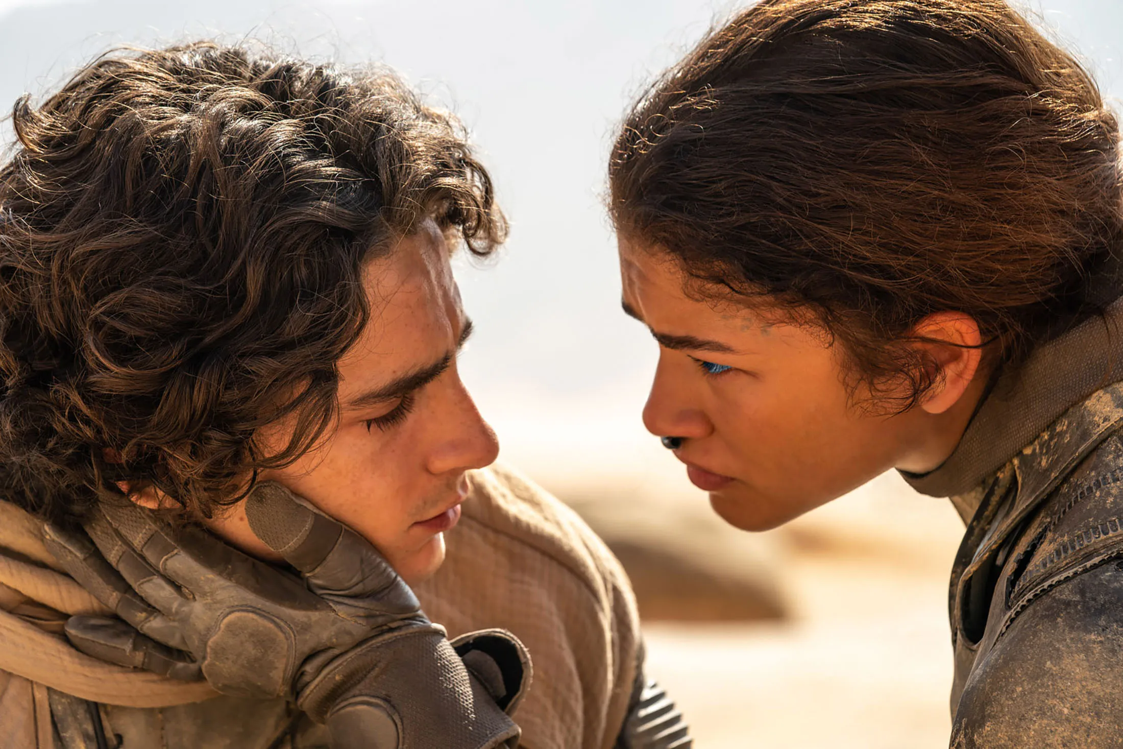 Timothee Chalamet as Paul Atreides and Zendaya as Chani.