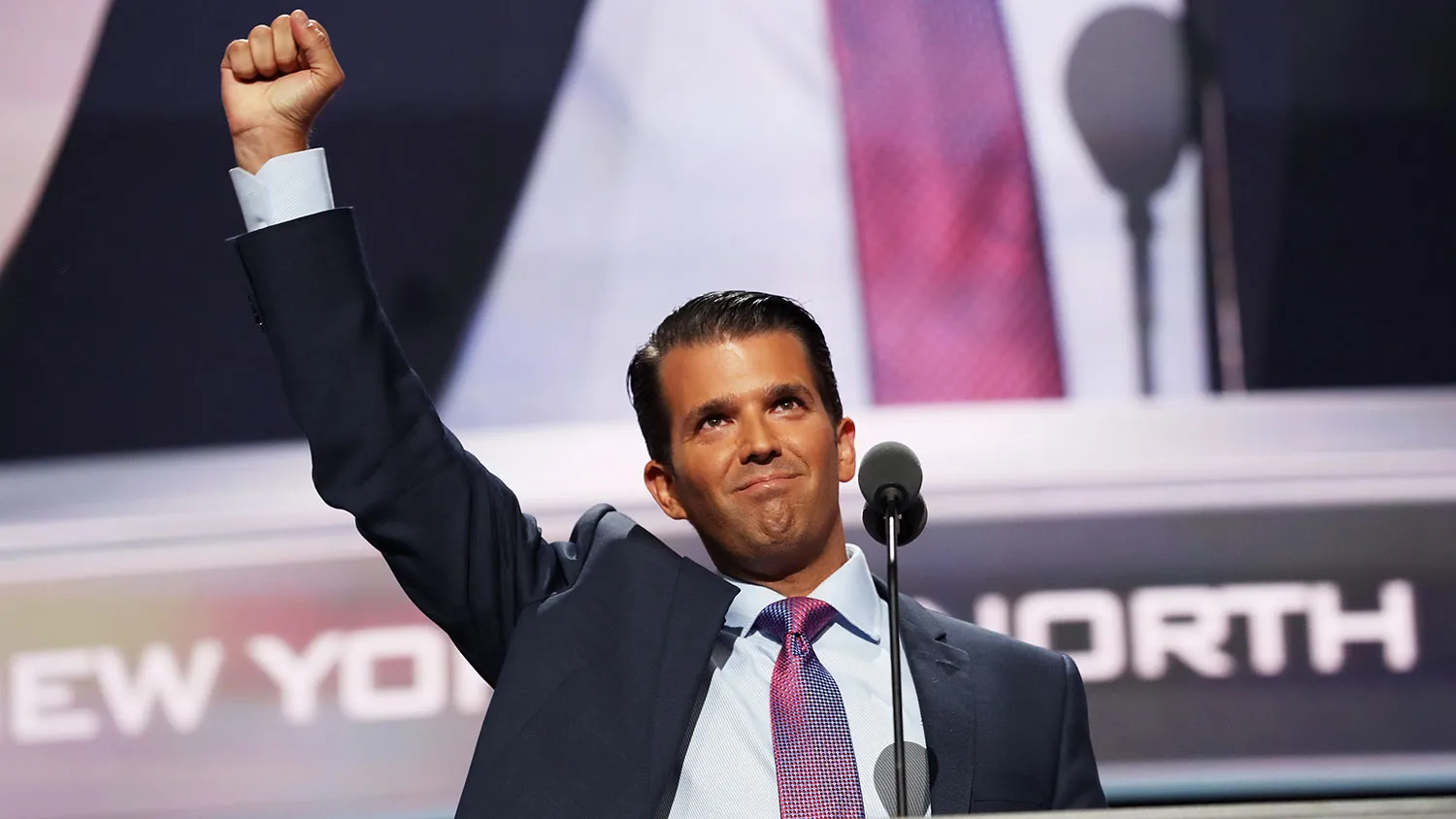 Donald Trump Jr. gestures to the crowd after delivering a speech on the second day of the Republican National Convention on July 19, 2016, at the Quicken Loans Arena in Cleveland.

