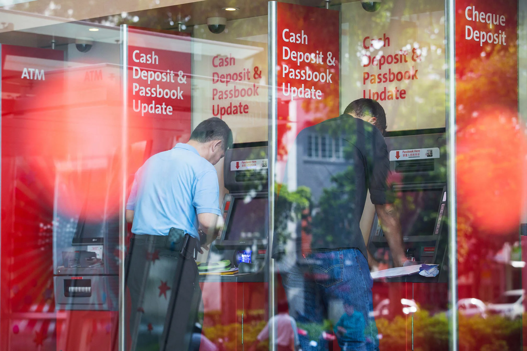 Inside OCBC And Wing Hang Bank Ltd. Bank Branches Following Acquisition By OCBC